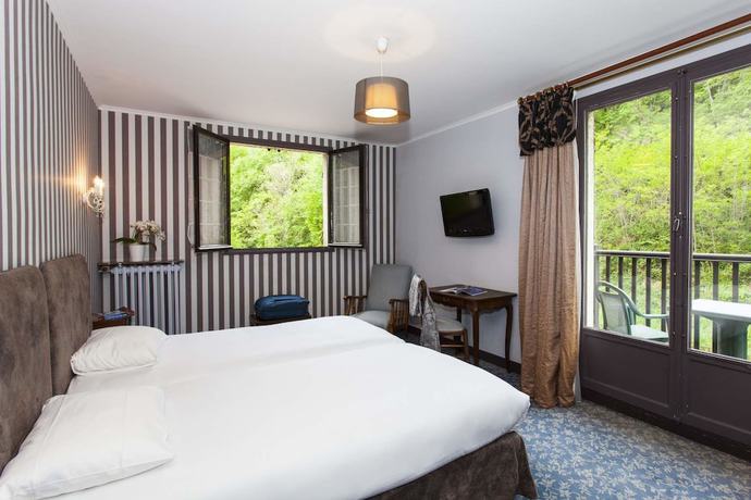 Imagen de la habitación del Hotel Hostellerie du Moulin des Ruats. Foto 12