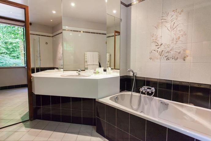 Imagen de la habitación del Hotel Hostellerie du Moulin des Ruats. Foto 13