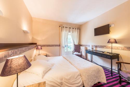 Imagen de la habitación del Hotel Hostellerie du Val d'Or. Foto 7