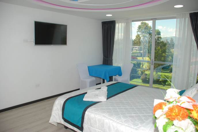 Imagen de la habitación del Hotel Hosteria Airport Garden. Foto 18