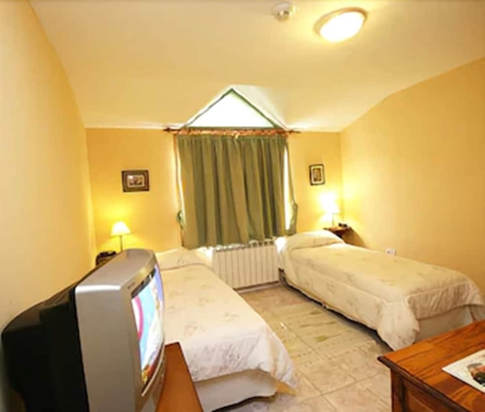 Imagen de la habitación del Hotel Hosteria Bella Vista. Foto 8