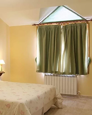 Imagen de la habitación del Hotel Hosteria Bella Vista. Foto 10