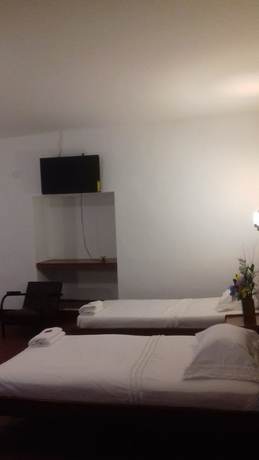 Imagen de la habitación del Hotel Hosteria Colonial La Cueva de Leo. Foto 11