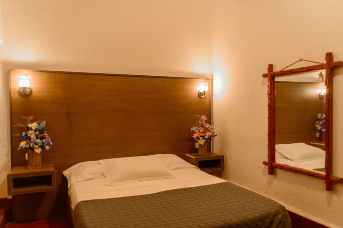 Imagen de la habitación del Hotel Hosteria Colonial La Cueva de Leo. Foto 13