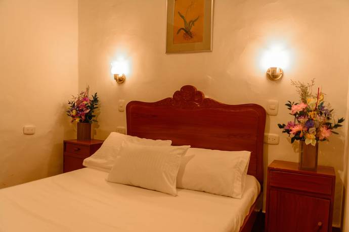 Imagen de la habitación del Hotel Hosteria Colonial La Cueva de Leo. Foto 14