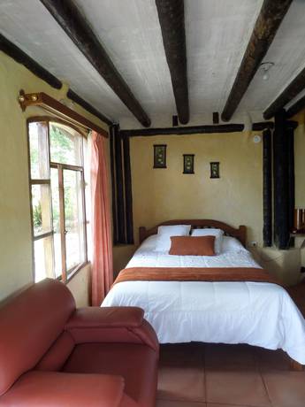 Imagen de la habitación del Hotel Hosteria El Encanto. Foto 9