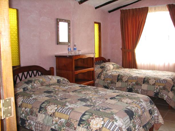 Imagen de la habitación del Hotel Hosteria El Encanto. Foto 13