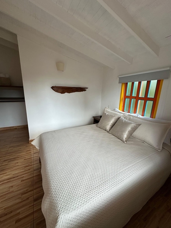 Imagen de la habitación del Hotel Hosteria El Paraiso, Jardin. Foto 6