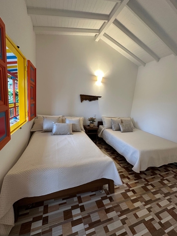 Imagen de la habitación del Hotel Hosteria El Paraiso, Jardin. Foto 9