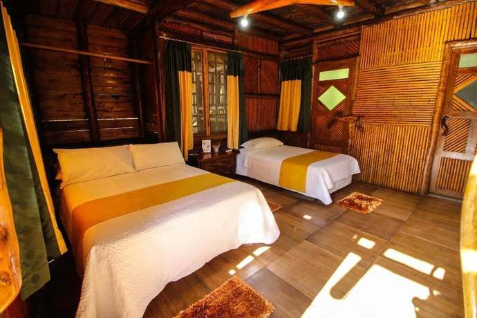 Imagen de la habitación del Hotel Hosteria Flor de Canela. Foto 12