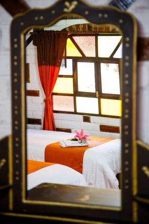 Imagen de la habitación del Hotel Hosteria Jardines de Chamana. Foto 7