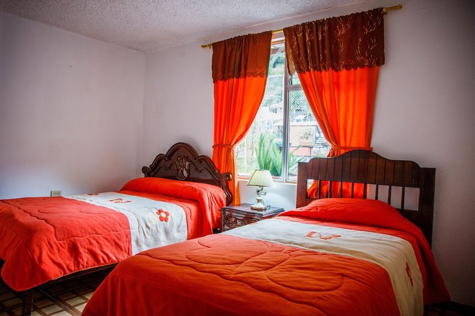 Imagen de la habitación del Hotel Hosteria Jardines de Chamana. Foto 8