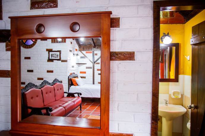 Imagen de la habitación del Hotel Hosteria Jardines de Chamana. Foto 11