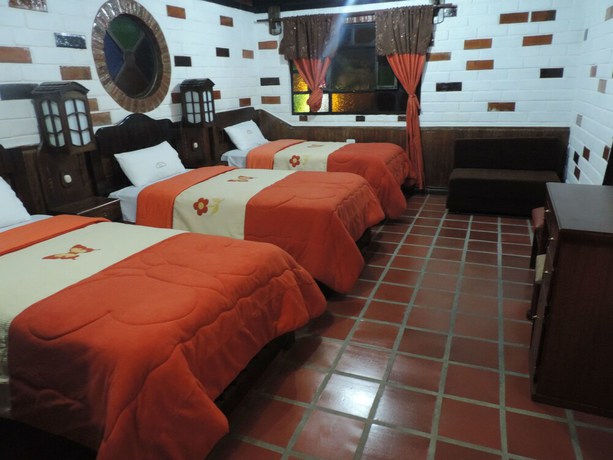 Imagen de la habitación del Hotel Hosteria Jardines de Chamana. Foto 12
