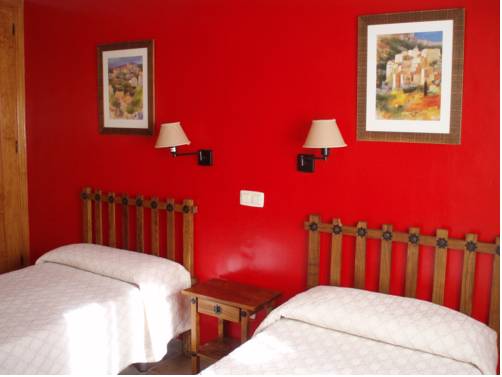 Imagen de la habitación del Hotel Hosteria Las Palmeras Casa Colonial. Foto 7