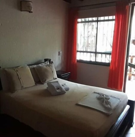Imagen de la habitación del Hotel Hosteria Tonusco Campestre, Santa Fe de Antioquia. Foto 8