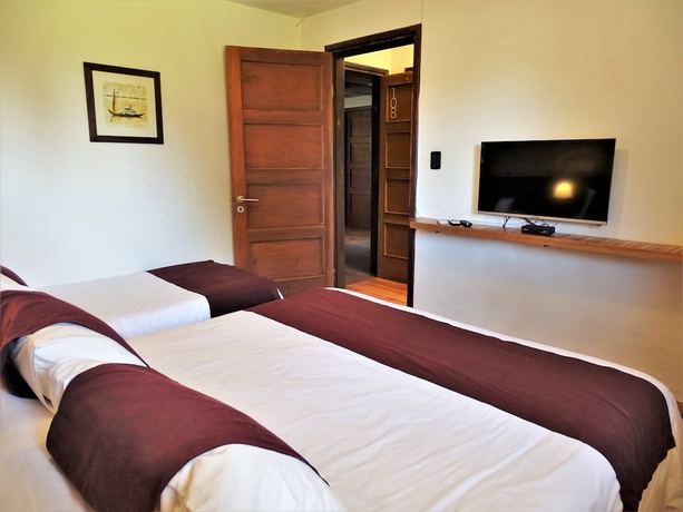 Imagen de la habitación del Hotel Hosteria del Pescador. Foto 10