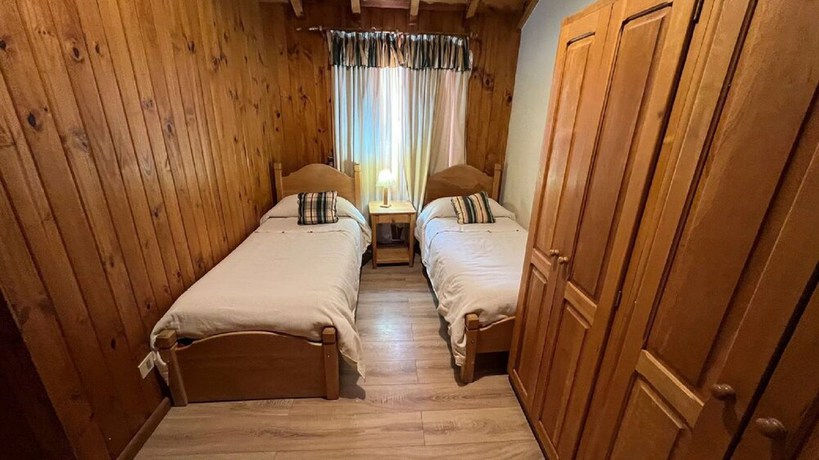 Imagen de la habitación del Hotel Hosteria y Caba&ntilde;as Posada Quinen by Nordic. Foto 11