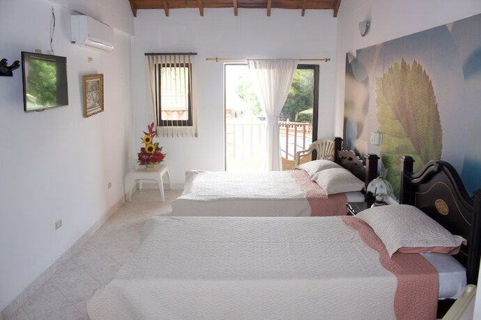 Imagen de la habitación del Hotel Hoster&iacute;a Bohios. Foto 26