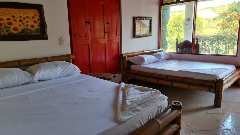 Imagen de la habitación del Hotel Hoster&iacute;a Brisas del R&iacute;o. Foto 20