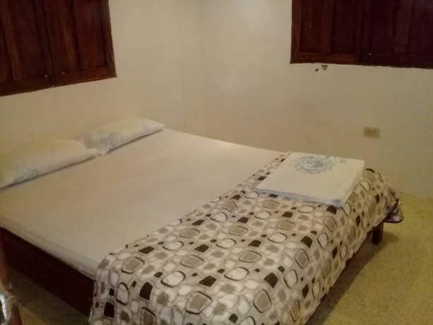 Imagen de la habitación del Hotel Hoster&iacute;a Pura Vida. Foto 6