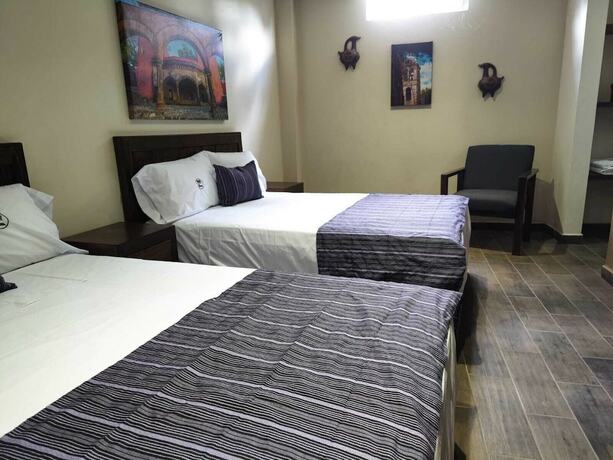 Imagen de la habitación del Hotel Hoster&iacute;a Tocali. Foto 8