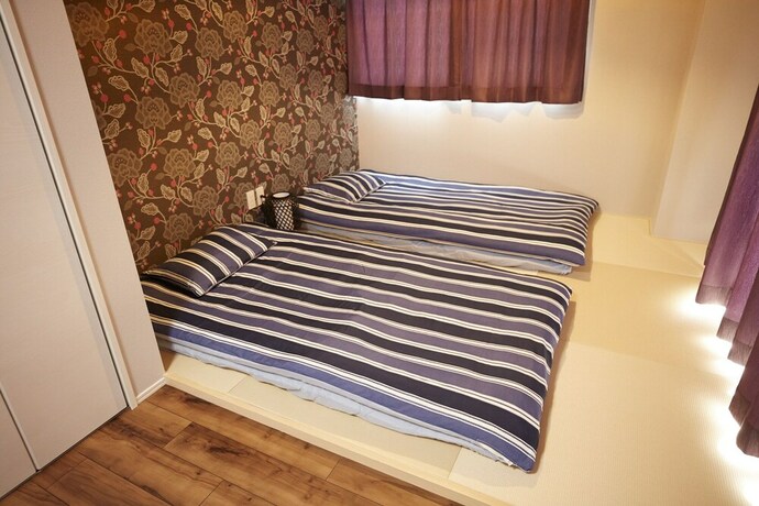 Imagen de la habitación del Hotel Hotalu Universal Vacation Kan. Foto 20