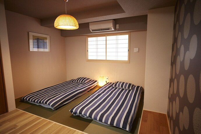 Imagen de la habitación del Hotel Hotalu Universal Vacation Kan. Foto 35