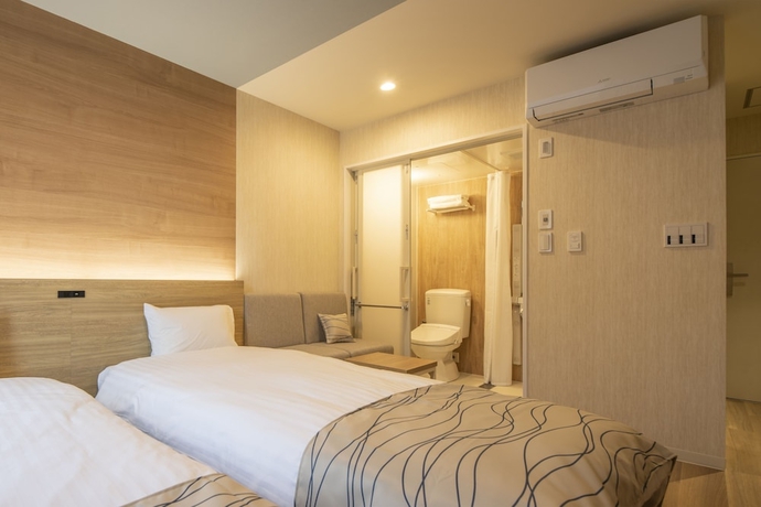 Imagen de la habitación del Hotel Hotel AMANEK Asahikawa. Foto 11