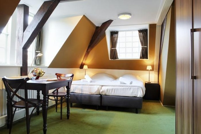 Imagen de la habitación del Hotel Hotel Aan De Dam. Foto 3