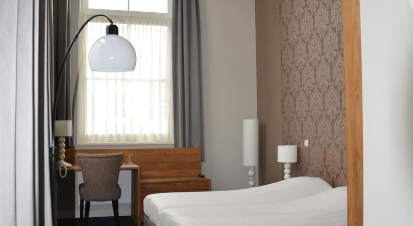 Imagen de la habitación del Hotel Hotel Aan De Singel. Foto 3