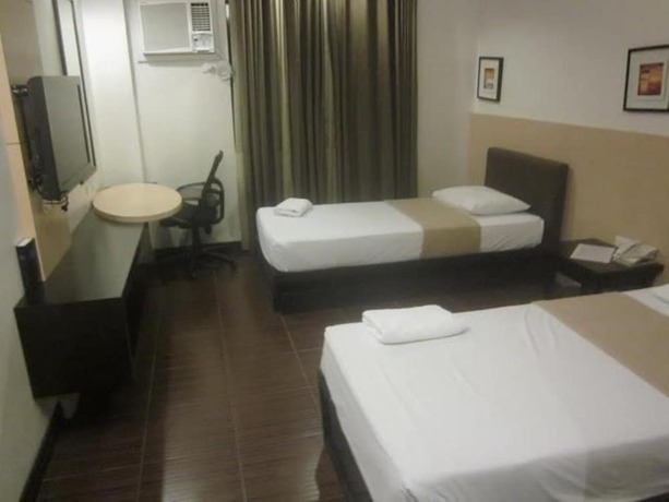 Imagen de la habitación del Hotel Hotel Ariana, Bauang. Foto 19