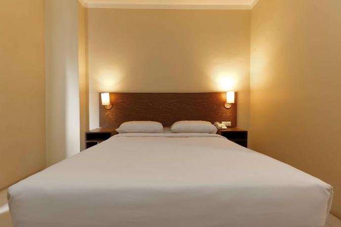 Imagen de la habitación del Hotel Hotel Artha Kencana. Foto 19