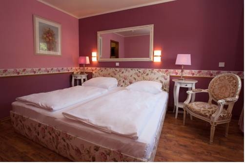 Imagen de la habitación del Hotel Hotel Ashley's Garden. Foto 5