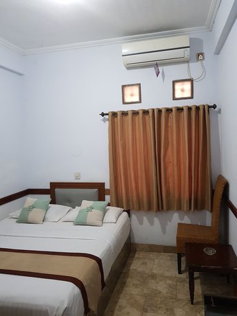 Imagen de la habitación del Hotel Hotel Bali Indah. Foto 12
