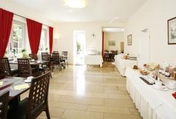 Imagen del bar/restaurante del Hotel Hotel Biederstein Am Englischen Garten. Foto 3