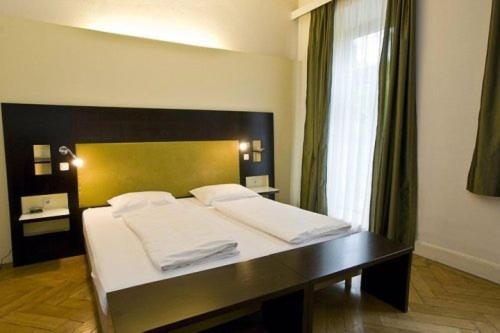 Imagen de la habitación del Hotel Hotel Brasserie. Foto 9