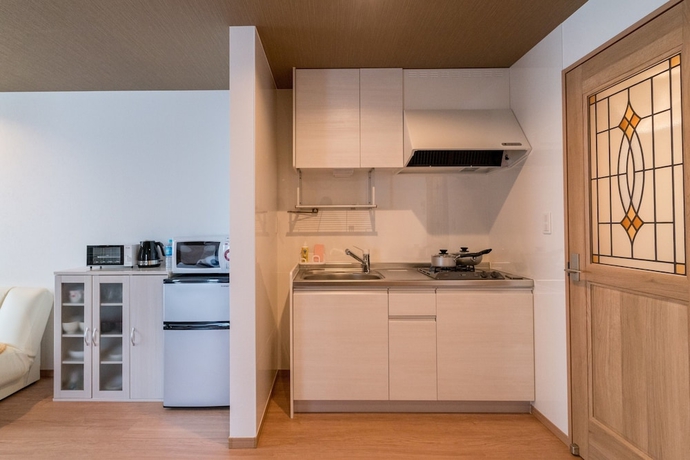 Imagen de la habitación del Hotel Hotel California Miyakojima Resort. Foto 11