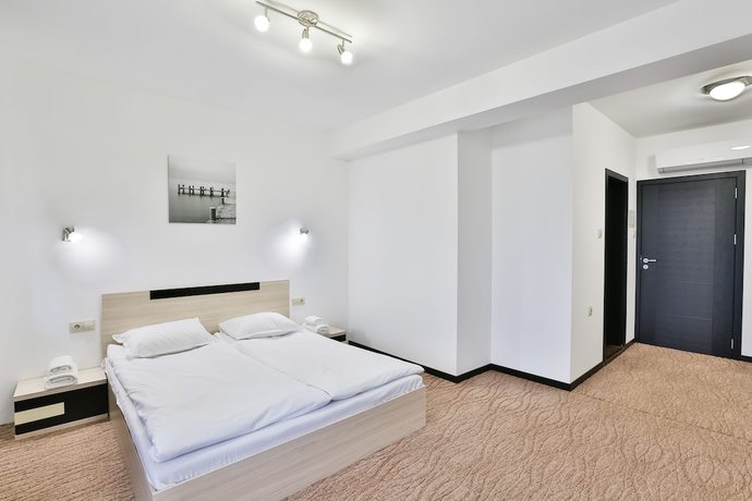 Imagen de la habitación del Hotel Hotel Champion. Foto 12