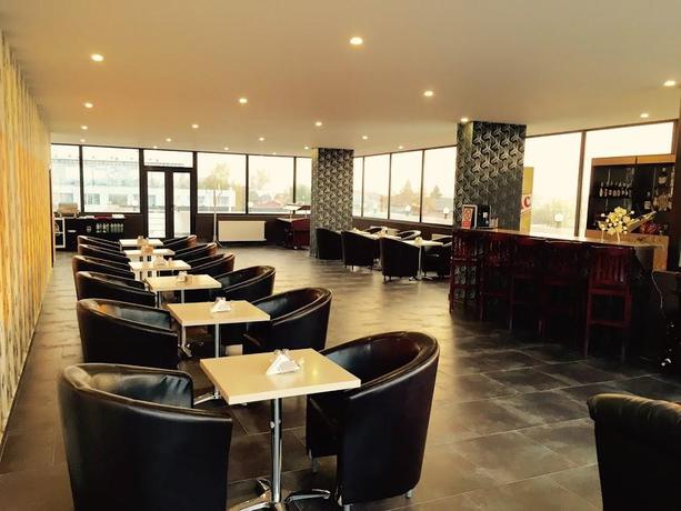 Imagen del bar/restaurante del Hotel Hotel Charter Otopeni. Foto 3