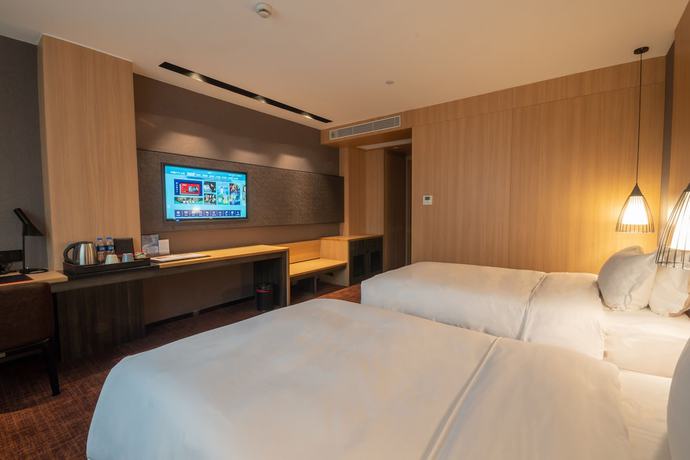 Imagen de la habitación del Hotel Hotel Coka Shanghai Pudong Airport. Foto 15