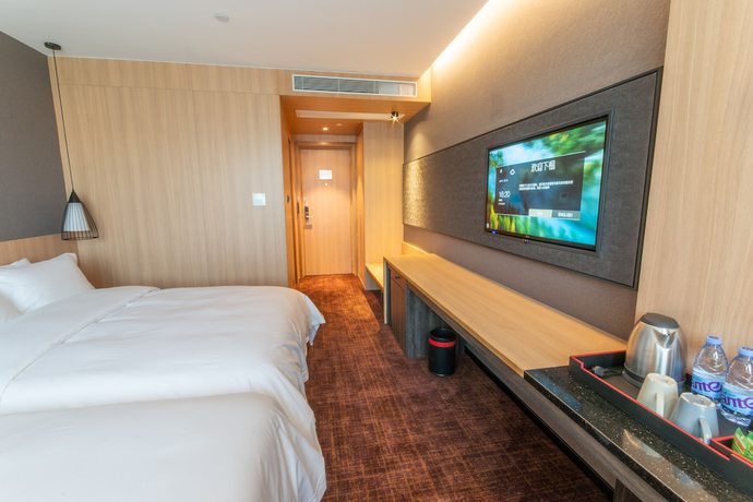 Imagen de la habitación del Hotel Hotel Coka Shanghai Pudong Airport. Foto 18