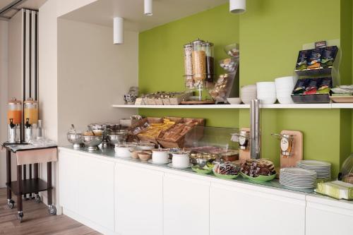 Imagen del bar/restaurante del Hotel Hotel Corso Alaxi Hotels. Foto 4