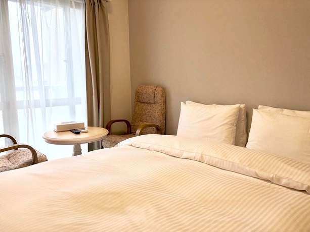 Imagen de la habitación del Hotel Hotel Cosmos Shintoshin Naha Omoromachi. Foto 7