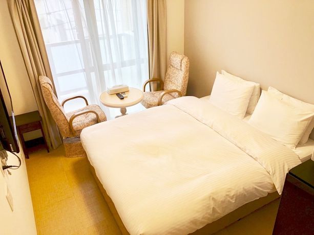 Imagen de la habitación del Hotel Hotel Cosmos Shintoshin Naha Omoromachi. Foto 13