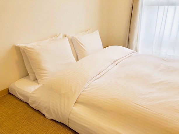 Imagen de la habitación del Hotel Hotel Cosmos Shintoshin Naha Omoromachi. Foto 18