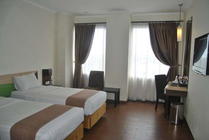 Imagen de la habitación del Hotel Hotel Dafam Pekalongan. Foto 6