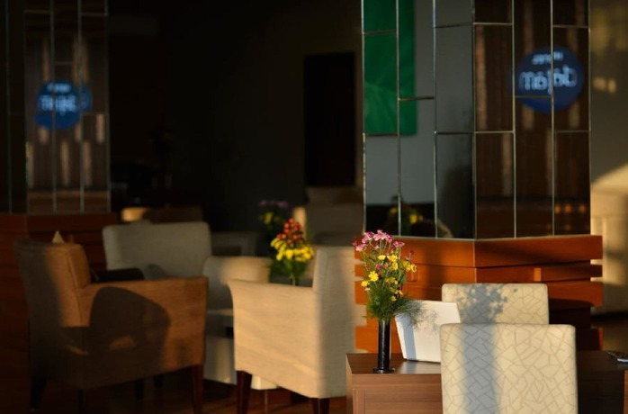 Imagen del bar/restaurante del Hotel Hotel Dafam Pekalongan. Foto 5
