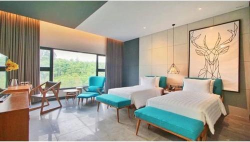 Imagen de la habitación del Hotel Hotel Dafam Wonosobo. Foto 7
