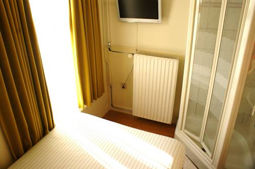 Imagen de la habitación del Hotel Hotel De Westertoren. Foto 3